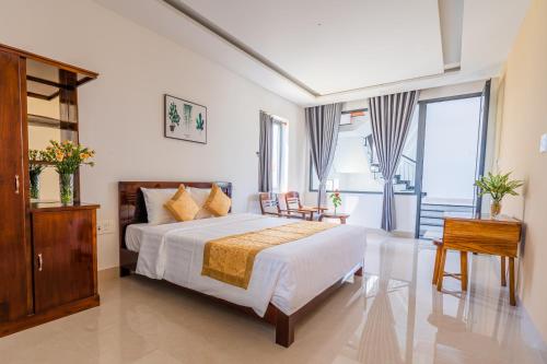 Giường trong phòng chung tại Aba Travel Villa