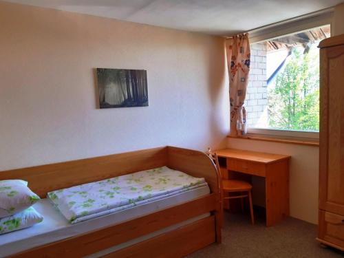 Llit o llits en una habitació de Butas Pijus