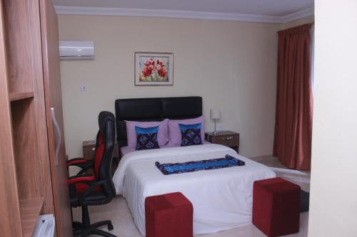 Katil atau katil-katil dalam bilik di RHOGEM Hotel