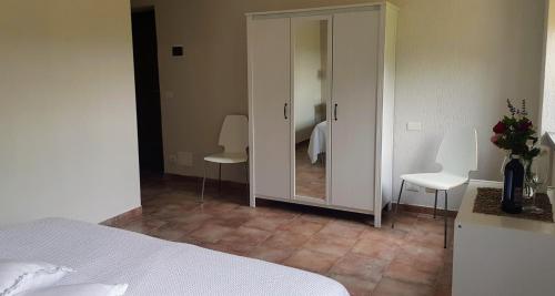 Villa Bella Piemonte tesisinde bir odada yatak veya yataklar