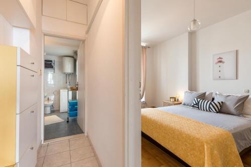 Posteľ alebo postele v izbe v ubytovaní 5th FLOOR Apartment- Harborview