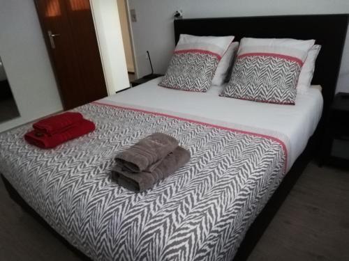 Een bed of bedden in een kamer bij Kokodor