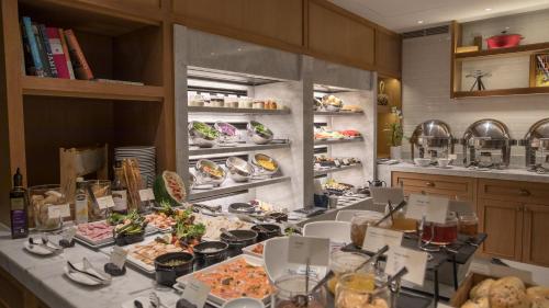 a table with food on it in a kitchen at InterContinental Pattaya Resort by IHG in Pattaya South