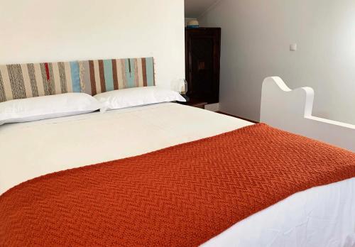 Ένα ή περισσότερα κρεβάτια σε δωμάτιο στο Casa de Campo Alter Pedroso