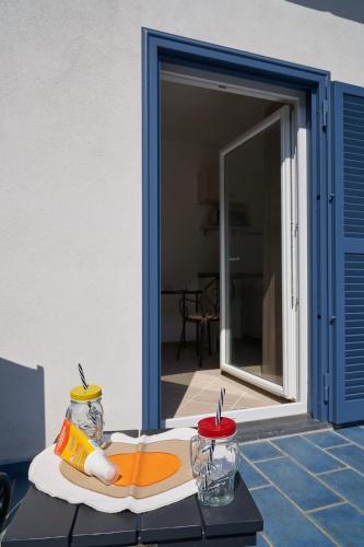 a tray of food on a table in front of a door at Maiori Dream House 1 in Maiori