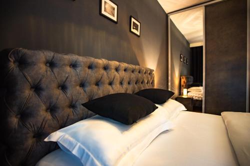 Кровать или кровати в номере Apartment Podgorica