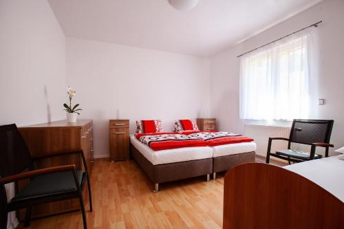 Postel nebo postele na pokoji v ubytování Apartmán Dominhaus
