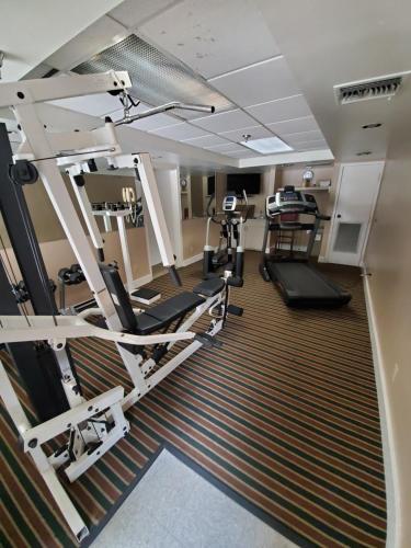an overhead view of a gym with tread machines at Ramada by Wyndham Temple Terrace/Tampa North in Tampa