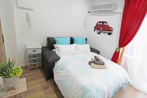 Voodi või voodid majutusasutuse Apartamento muy céntrico 5 minutos playa (2º) toas