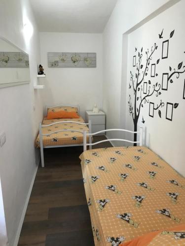 Säng eller sängar i ett rum på Podere Venanzio