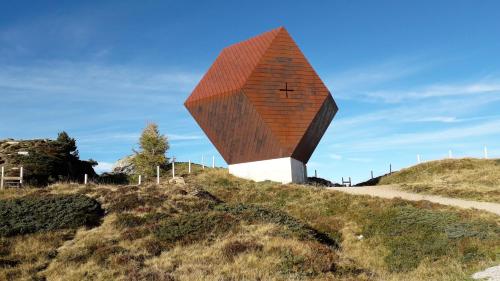 a building on the side of a hill at Haus Sonja in Finkenberg