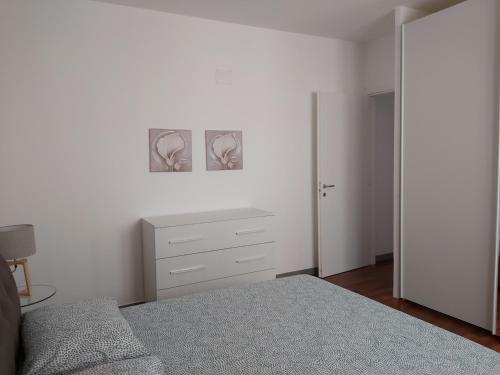 Posteľ alebo postele v izbe v ubytovaní Beach House