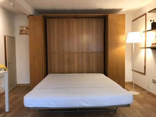 Casa del Viandante Lago di Como tesisinde bir odada yatak veya yataklar