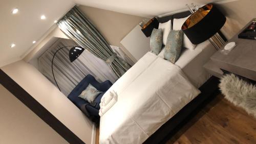 Ein Bett oder Betten in einem Zimmer der Unterkunft Hotel Allegra