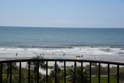 a view of a beach with people in the ocean at Ocean Dream Vacation in Myrtle Beach