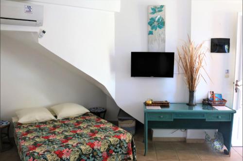TV a/nebo společenská místnost v ubytování Complexe La Providencia - Villa, Duplex, Studio, jacuzzi