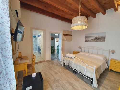Postel nebo postele na pokoji v ubytování B&B La Terrazza di NonnAnna