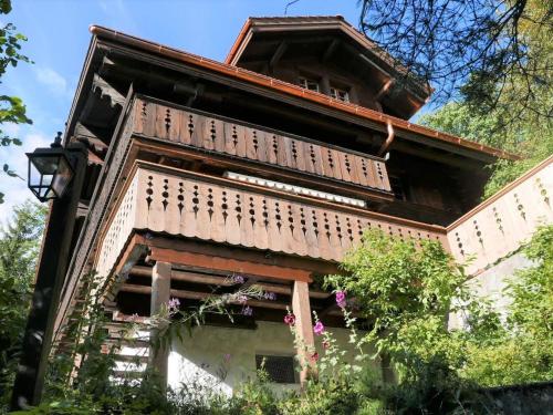 a building with balconies on the side of it at Apartment Tree-Tops- Chalet by Interhome in Gstaad