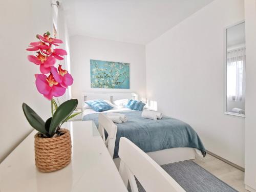 Postel nebo postele na pokoji v ubytování Apartment Marina