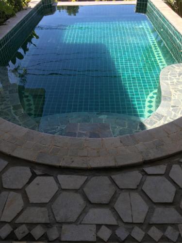The swimming pool at or near Phong Nha Farmstay