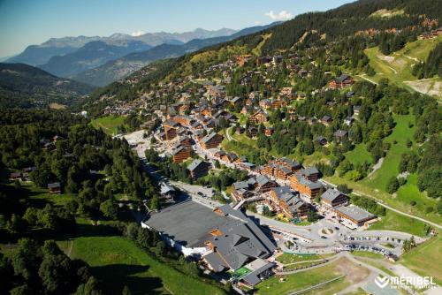 an aerial view of a town in the mountains at Hotel La Chaudanne in Méribel