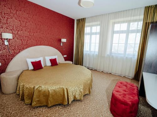Postel nebo postele na pokoji v ubytování Hotel Zamek Gniew