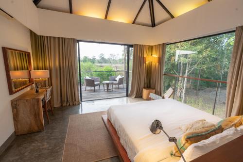 Voodi või voodid majutusasutuse Kaav Safari Lodge, Kabini toas