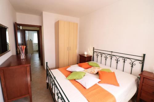 En eller flere senge i et værelse på Casa Vacanze Martina a Otranto