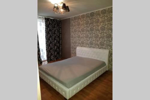 Postel nebo postele na pokoji v ubytování 2к Метро Студенческая Героев Труда Французский бульвар