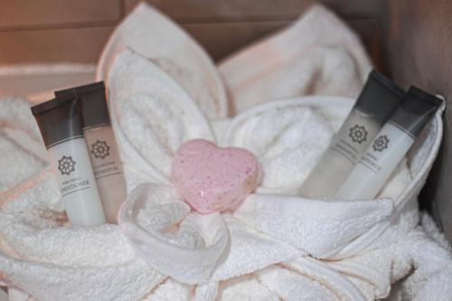 a box with two makeup products and a pink heart at The Cato Suites Hotel in Durban