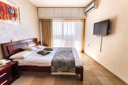 Postel nebo postele na pokoji v ubytování Hotel Blue Weiss