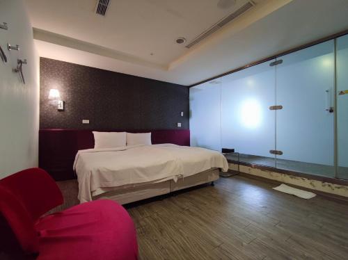 Postel nebo postele na pokoji v ubytování Walker Hotel - Zhengyi