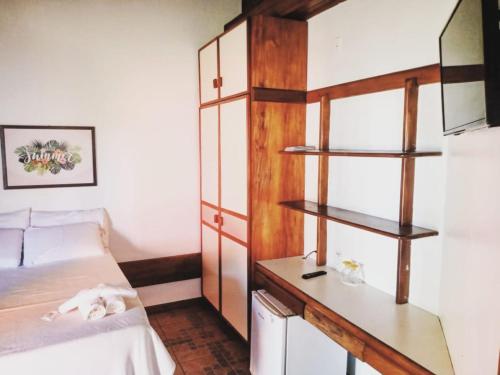 Postel nebo postele na pokoji v ubytování Pousada E Restaurante Doce Desejo