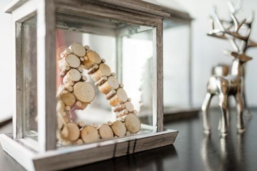a glassason jar filled with rocks in a room at Hotel Neumaier in Xanten