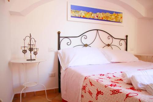 Postel nebo postele na pokoji v ubytování Il Borghetto Apartments & Rooms