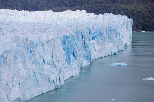 a large glacier in a body of water at Lagos Del Calafate in El Calafate