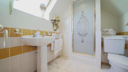Ένα μπάνιο στο The Old Tramhouse Self Catering Apartments