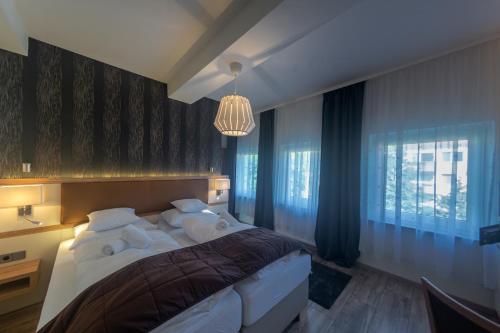 Ein Bett oder Betten in einem Zimmer der Unterkunft Hotel Klosterturm