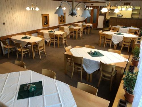 an overhead view of a restaurant with tables and chairs at Kemp Rumcajs in Jičín