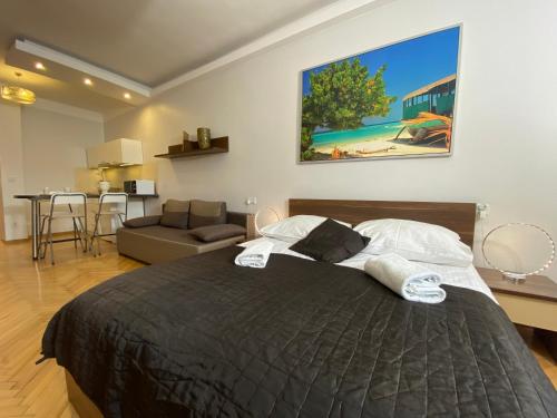 Postel nebo postele na pokoji v ubytování P&J Apartments Floriańska