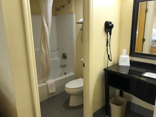 A bathroom at Days Inn by Wyndham Ridgeland South Carolina