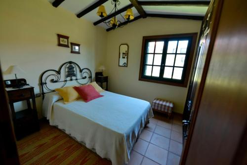 A bed or beds in a room at Un Paraiso Junto al Mar