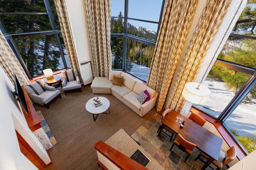 an overhead view of a living room with large windows at Everline Resort and Spa, Lake Tahoe in Olympic Valley
