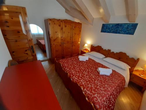 Ένα ή περισσότερα κρεβάτια σε δωμάτιο στο Cortalta Mountain Lodge