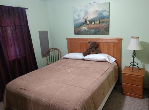 Ένα ή περισσότερα κρεβάτια σε δωμάτιο στο Hall Creek Cabin