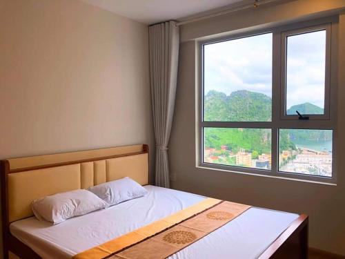 Krevet ili kreveti u jedinici u objektu Hạ Long Sapphire Charming City&Bay-View-2Bedroom Homestay Bk