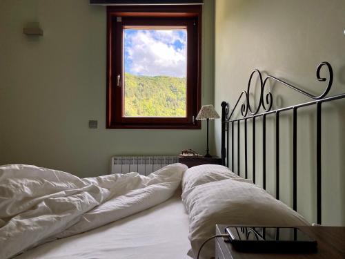 Posteľ alebo postele v izbe v ubytovaní Apartaments Turístics Cal Patoi
