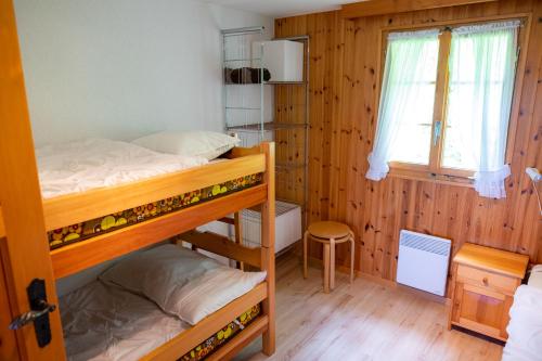 Postel nebo postele na pokoji v ubytování Chalet Orion