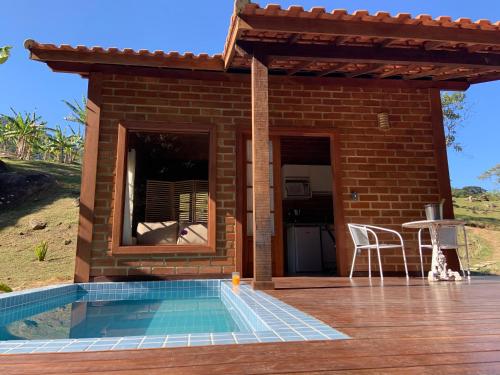 Piscina en o cerca de Cactus Chalés & Cabanas em lumiar
