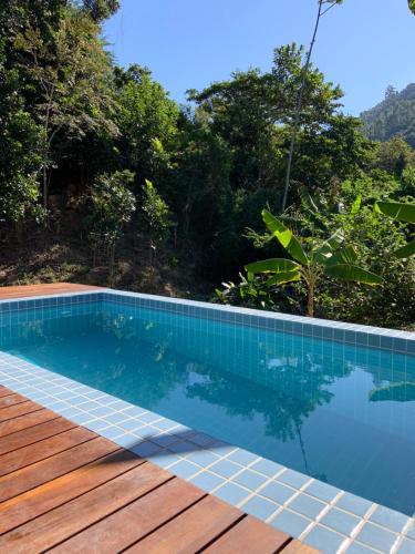 A piscina localizada em Cactus Chalés & Cabanas em lumiar ou nos arredores